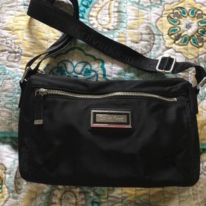 Calvin Klein purse, black with adjustable strap.